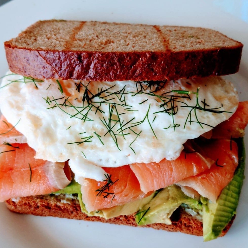 Cured Salmon, Avocado And Egg On A Toast.